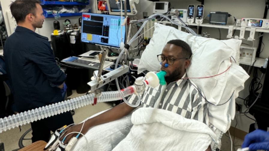 Tyler Law using the pulse oximeter on a patient
