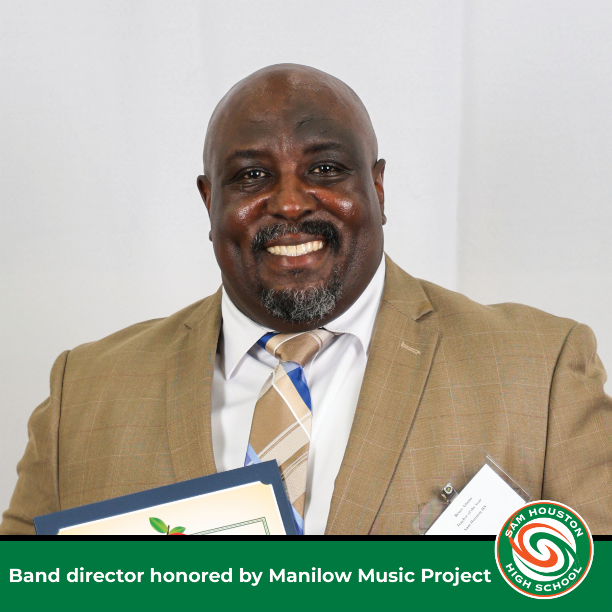 Band director honored by Manilow Music Project