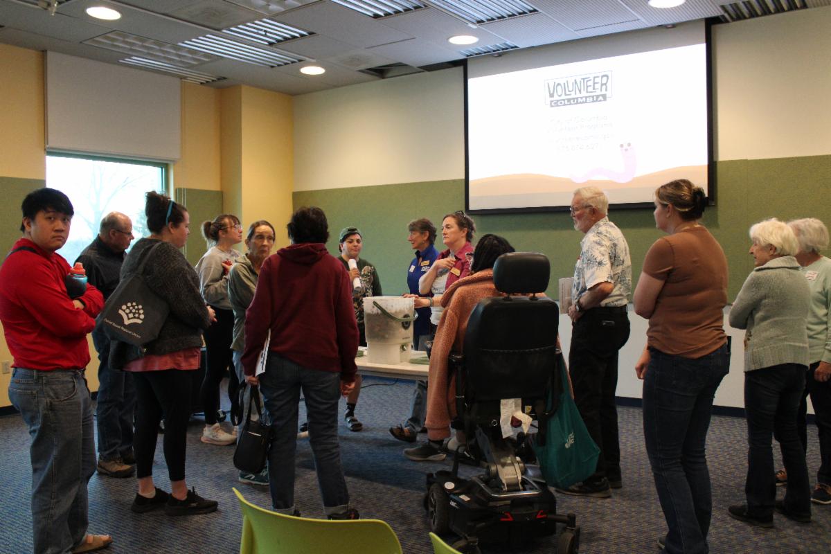 Community members attend a compost workshop held at the Columbia Public Library. 