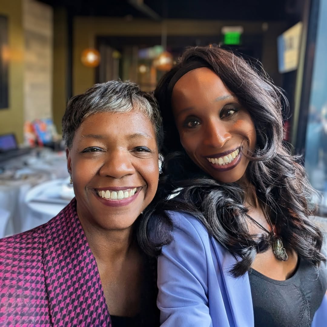 Carolyn Coleman and Erica L. Manuel smiling side by side