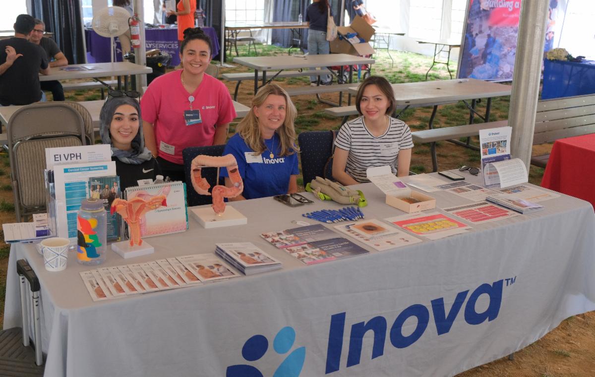 Representatives of Inova health systems at their booth of the Community Resource Fair.