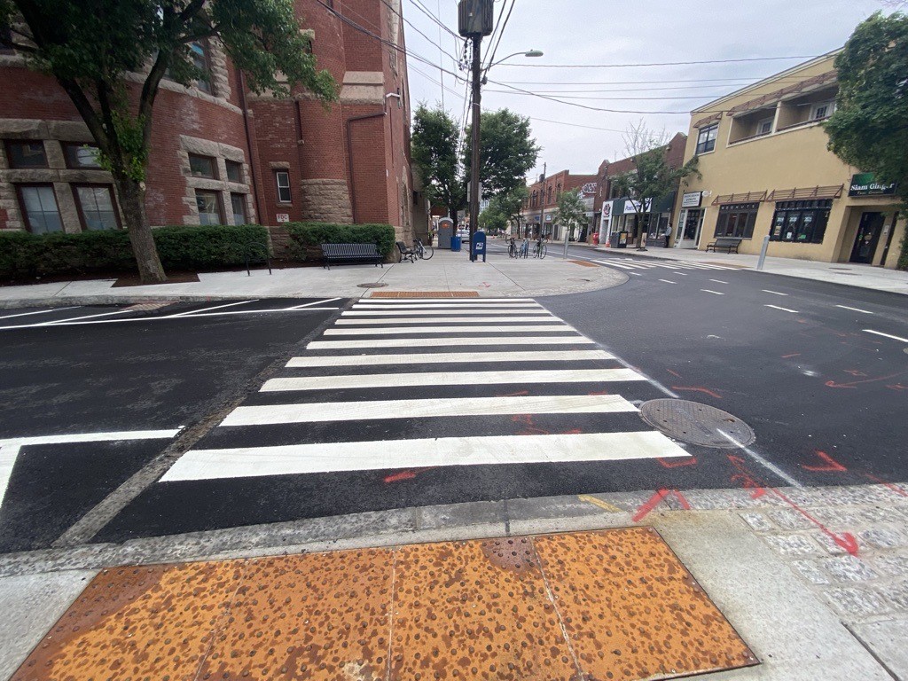 Crosswalk across Walnut Street as seen facing east down Bow Street toward Union Square.