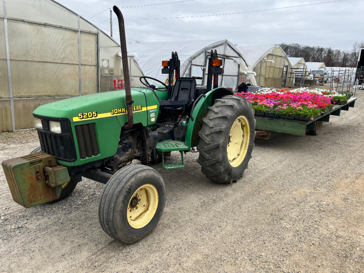 Tractor with geraniums