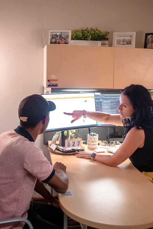 Advisor helping student