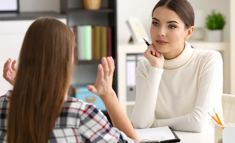 an image of two people having a conversation