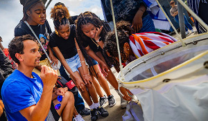 Students learn about collecting samples from Scripps Pier.