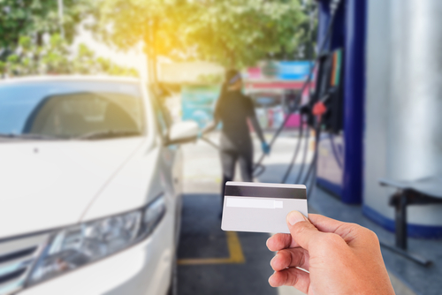 Credit card to make a payment for refueling car on gas station