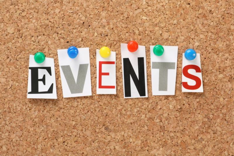The word Events in cut out magazine letters pinned to a cork notice board. Events may refer to news