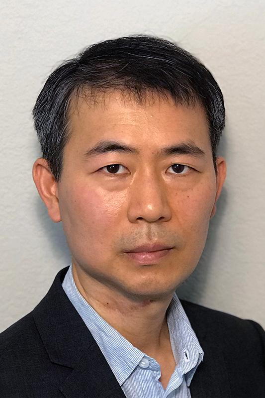 A man with short black hair