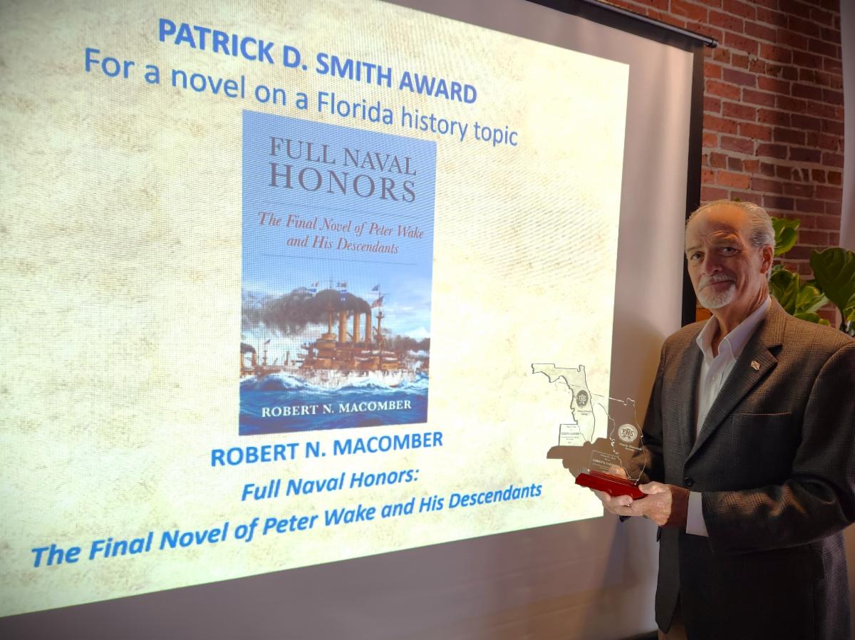 Robert N. Macomber wins the Patrick D. Smith Award from the FL Historical Society for his 17th novel FULL NAVAL HONORS.