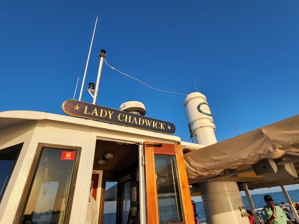Author and lecturer Robert N. Macomber speaks to a sold out crowd aboard the LADY CHADWICK for the Useppa Island Historical Society sunset cruise.