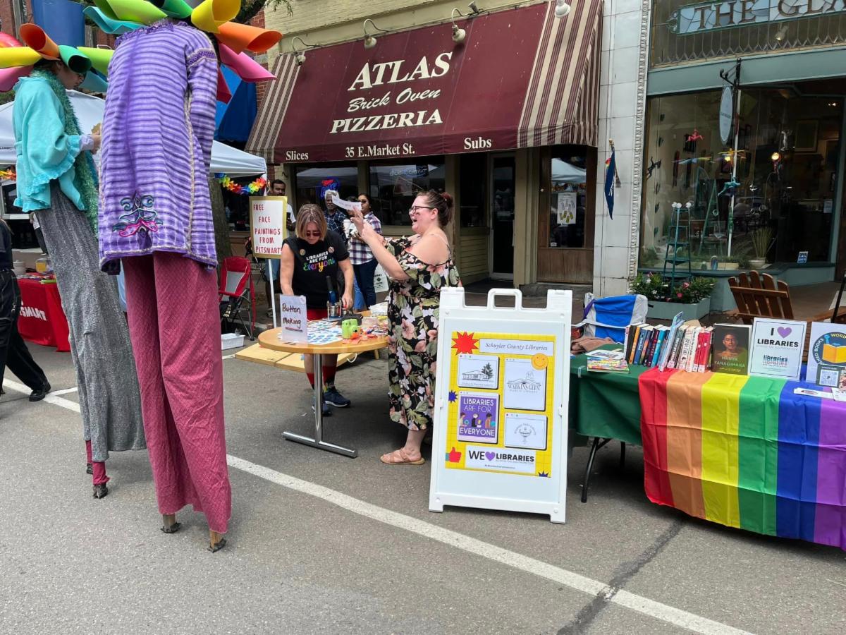 people on stilts at soflx pride