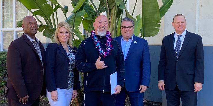 SDCOE staff pose with Chris Toomey
