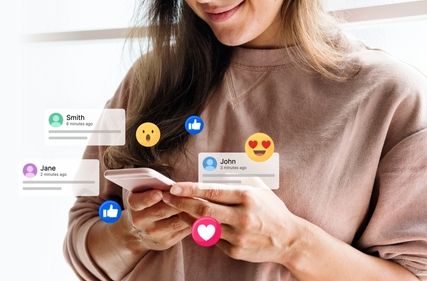 Woman using smartphone with social media icons. Notifications_ likes_ and emojis float around. Engaged with social media_ checking updates_ receiving likes. Social media icons and emojis.