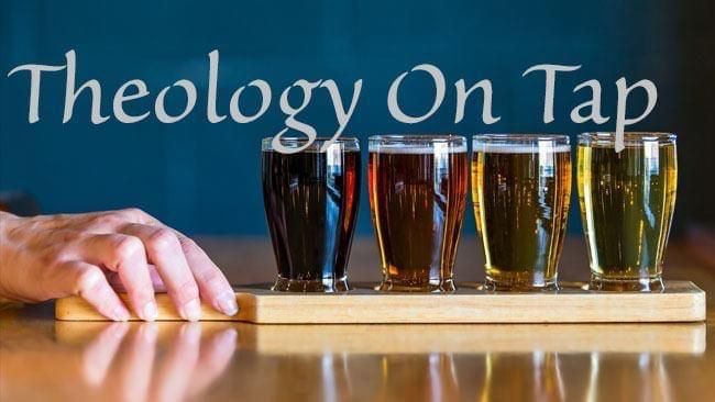 A Caucasian hand slides a wooden platter of glasses filled with amber-brown beer across a wooden table. Text over the drinks reads "Theology on Tap."