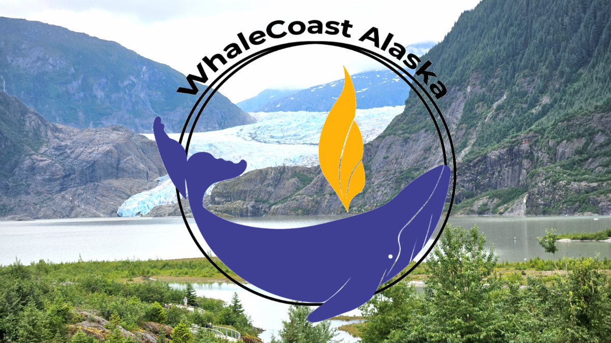 An Alaskan landscape with forests, mountains, and a glacier with the Whale Alaska logo - A whale curved in the 2 circles of the traditional UU logo with a chalice flame above its blowhole.