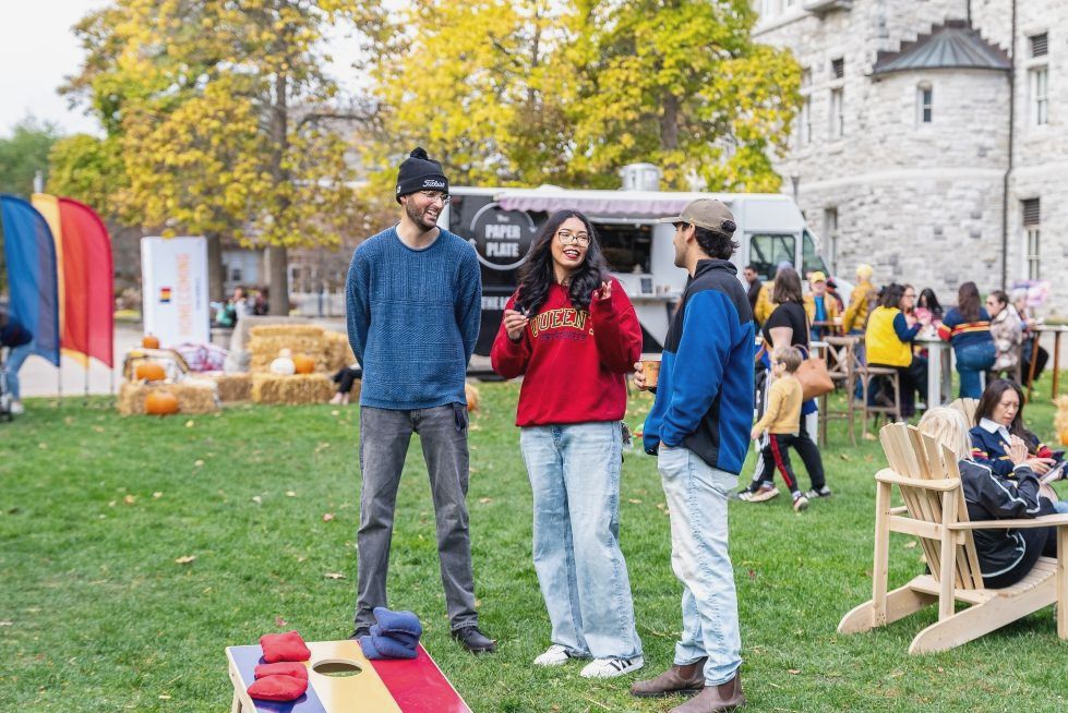 Students chat at the Homecoming Autumn Harvest Gathering