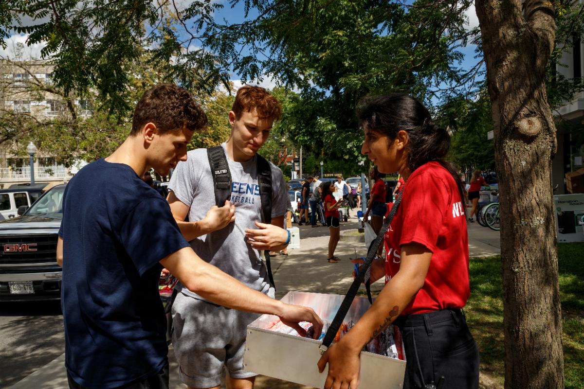 Move-In Volunteers with hand-outs