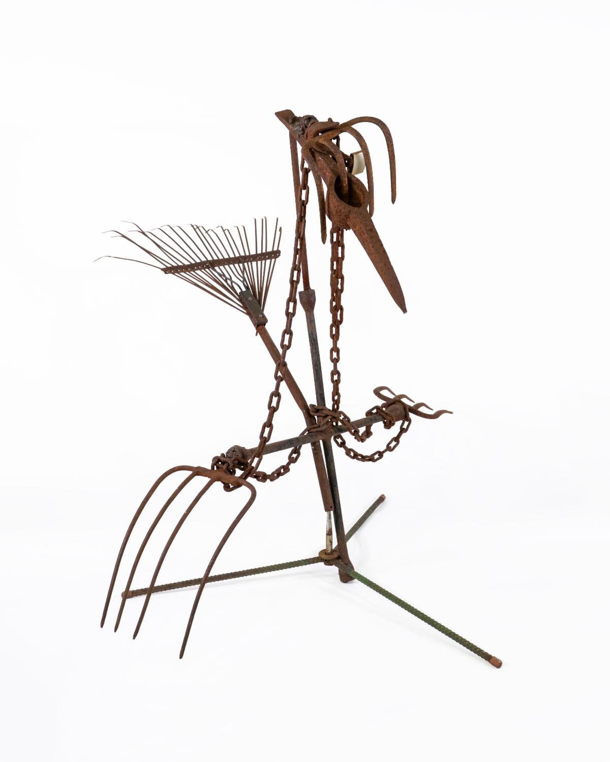 Joe Minter, Yard Bird, 1998. Tire iron, rebar, pitchfork heads, rake, pickaxe, chain, and padlock, 40 × 48 × 47 inches (101.6 × 121.9 × 119.4 cm).