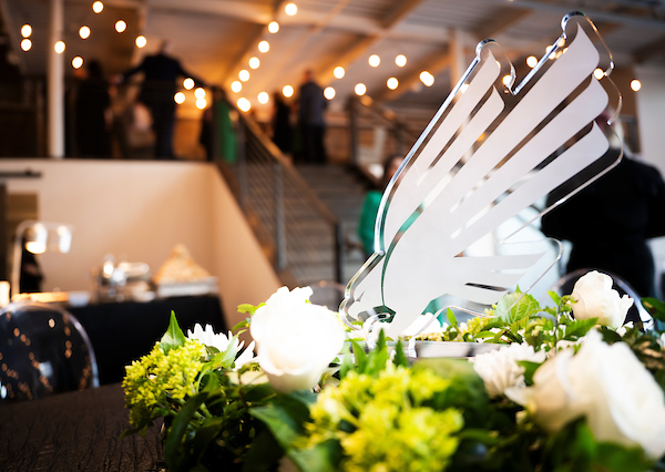 Glass Diving Eagle table decorations at Salute to Faculty Excellence awards