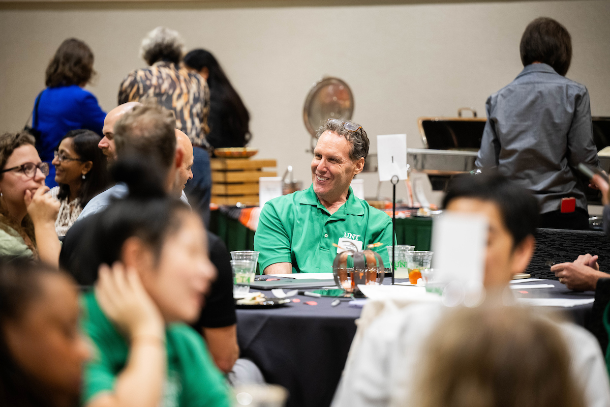 Faculty participating in table discussions at 2024 Speed Mentoring Luncheon