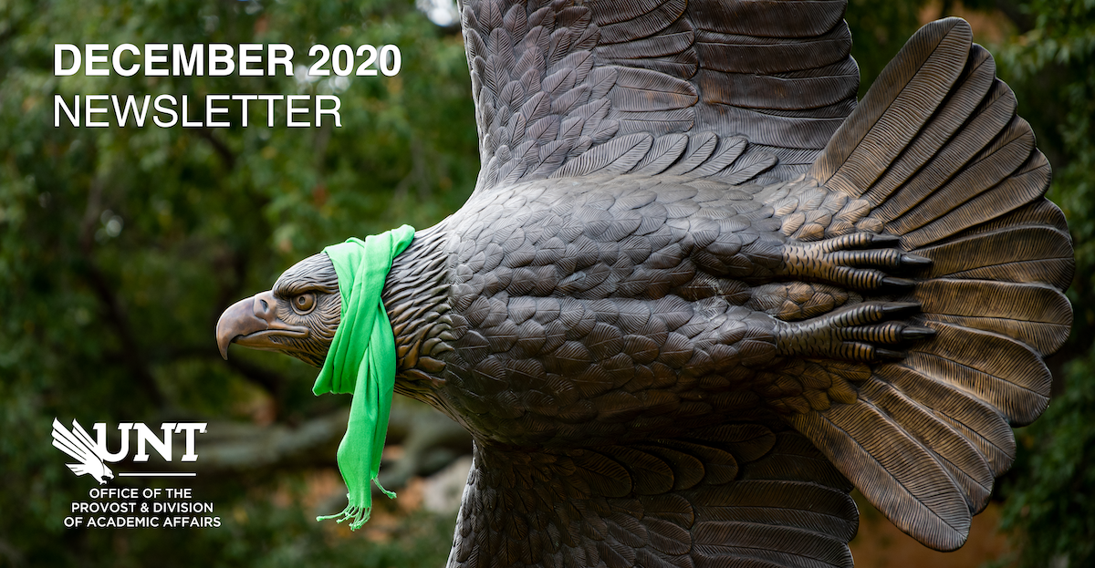 UNT eagle statue wearing green scarf