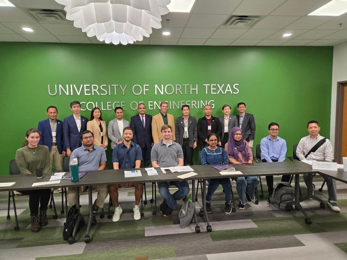 International researchers pose with College of Engineering faculty during a visit to Discovery Park