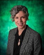 Photo of UNT vice provost for faculty success Holly Hutchins against a green background