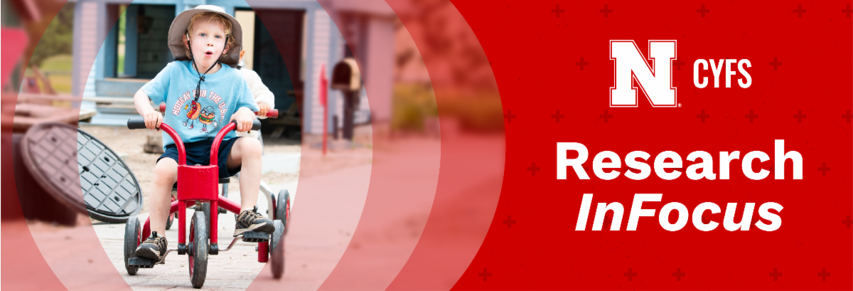 header image with child riding trike.