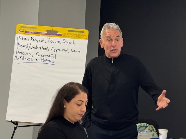 Win Turner speaks to training participants