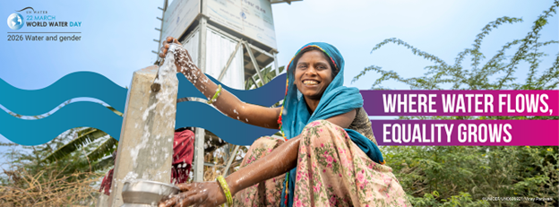 a woman gets water from a well