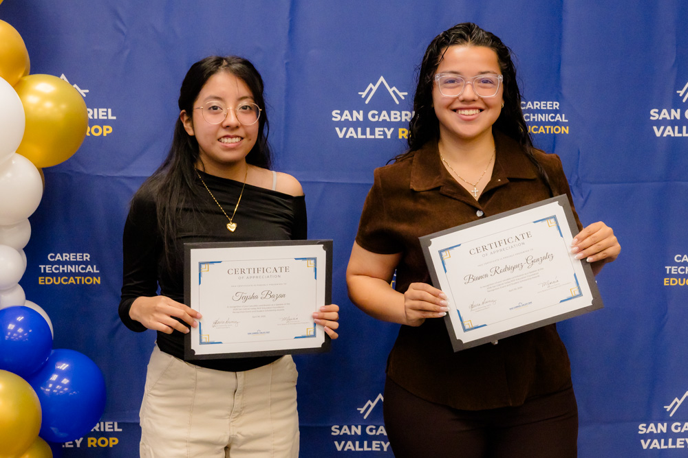 SGVROP Business Partners holding up certificates