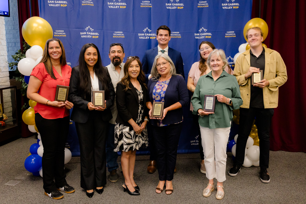SGVROP Business Partners holding up congratulatory plaques
