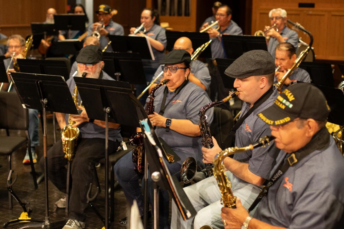 Members of the UTSA Arts On-Corps Presidio Jazz Ensemble perform with their saxophones