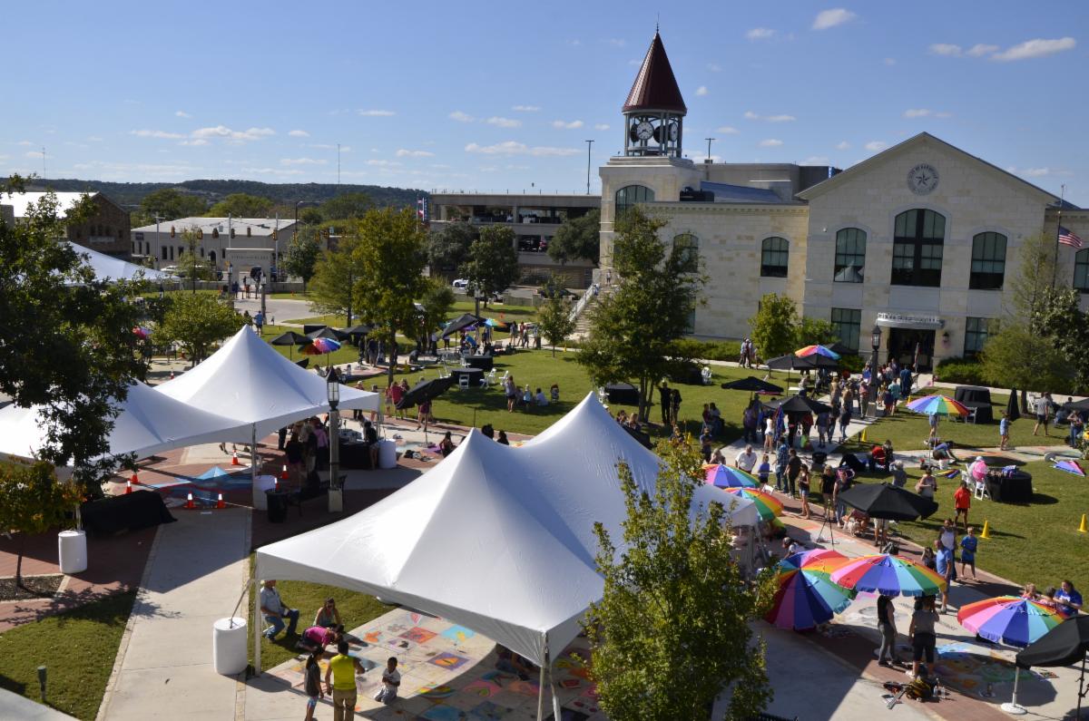 An aerial view of a festival in the Kerrville Cultural District
