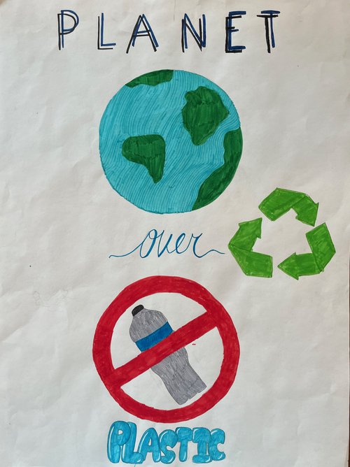 A child's drawing of the Earth above a plastic water bottle that has been crossed out with the text planet over plastic 