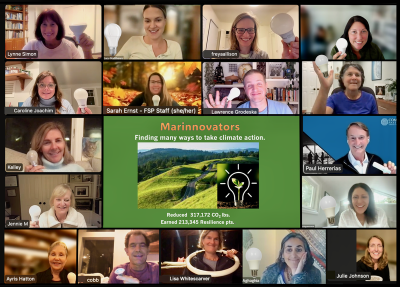 Screenshot of Zoom workshop for resilient neighborhoods with participants posing and smiling 