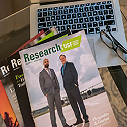 image of magazine on laptop