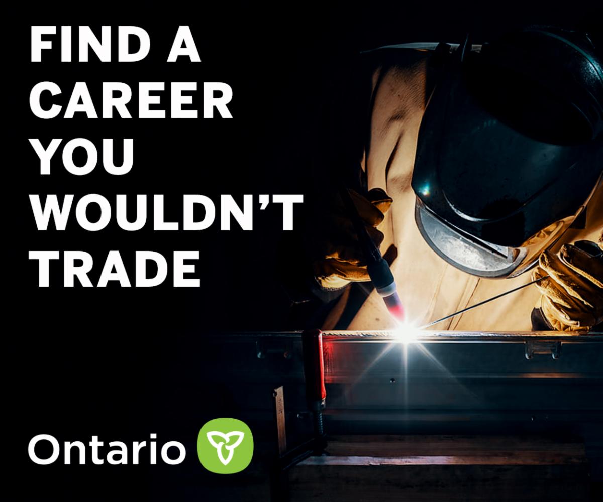 Person welding with Ontario Government logo