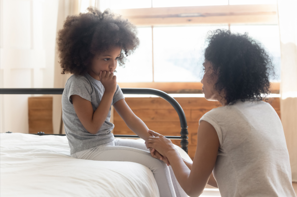 woman talking to child