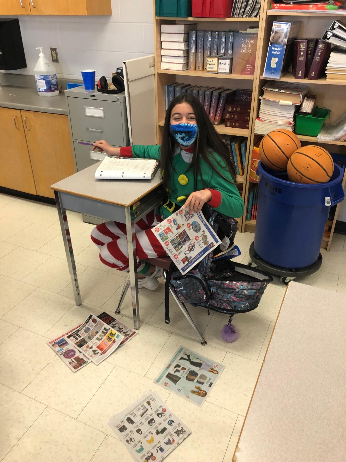 Female student wearing a mask in a classroom 