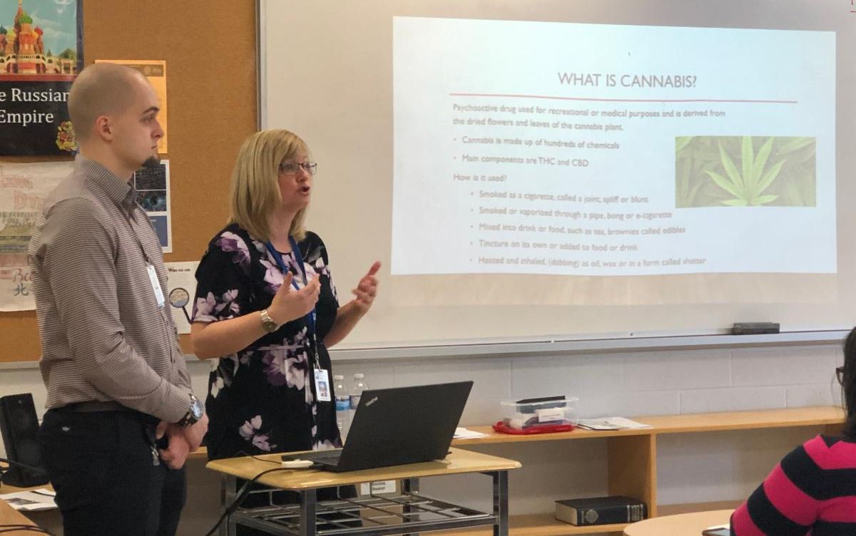 Female and male adults speaking to parents about Cannabis Use in teens.