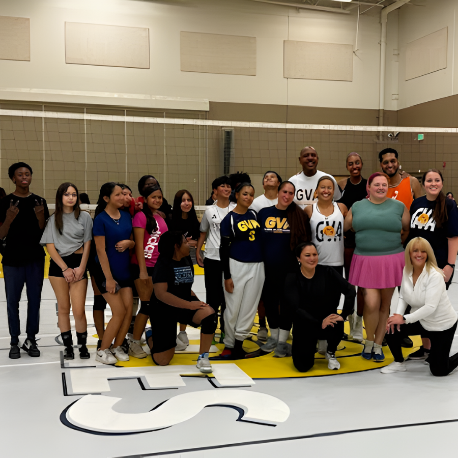 Staff vs students volleyball game participants
