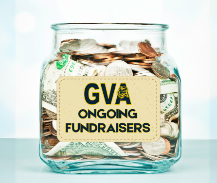 Glass jar filled with money and a label that says GVA Ongoing Fundraisers