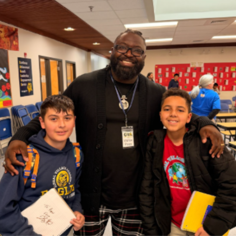 Adult and two students