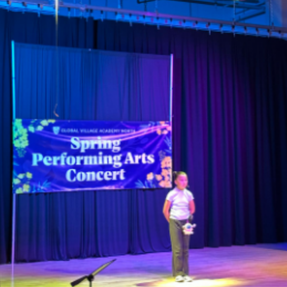 Student on stage doing a solo performance