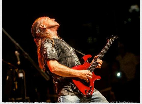 Mark Farner playing electric guitar