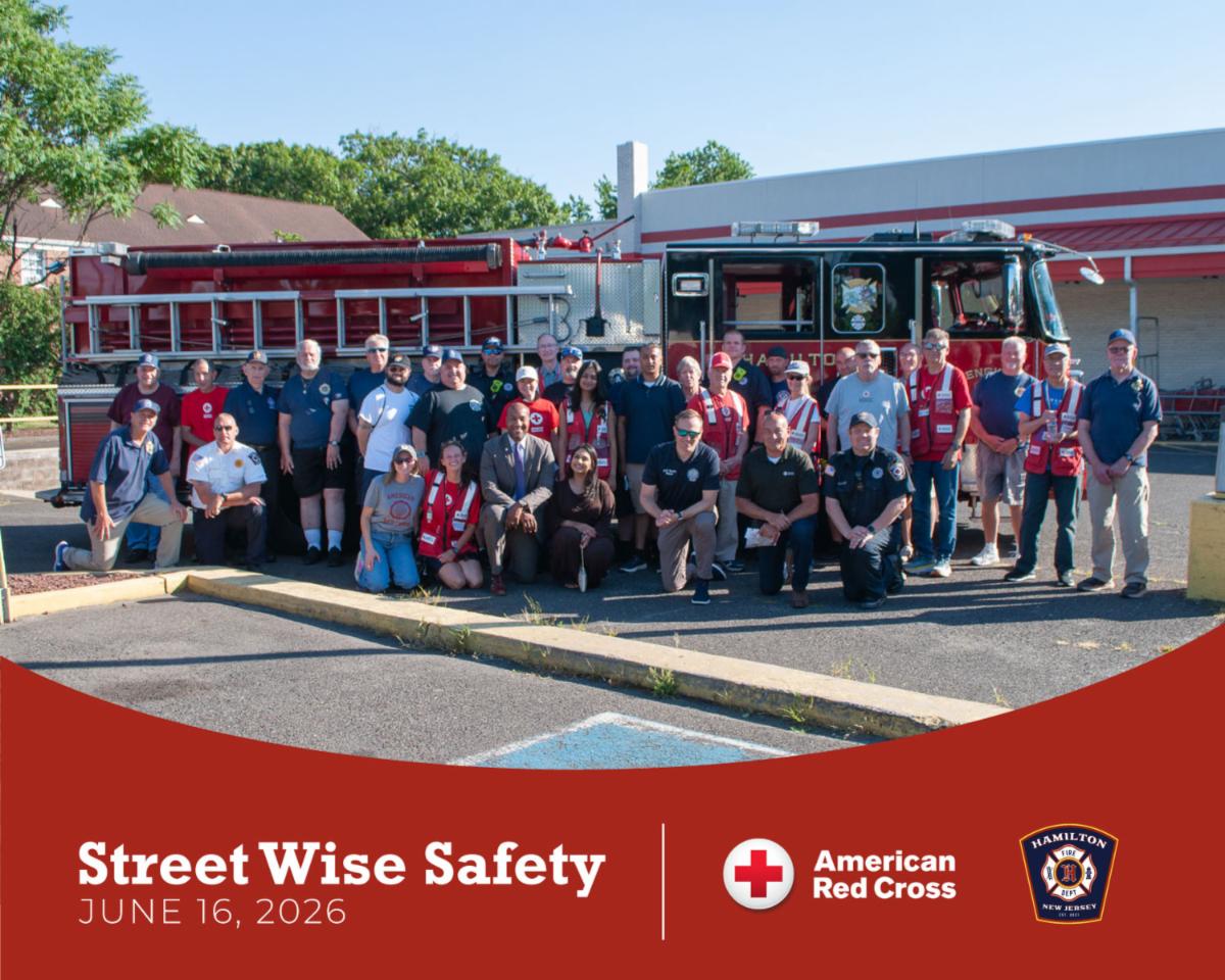 Graphic with group photo of community organizations, the Hamilton fire division, and  red cross with red swoosh bottom graphic that has fire division and red cross logo and white text that says street wise safety event