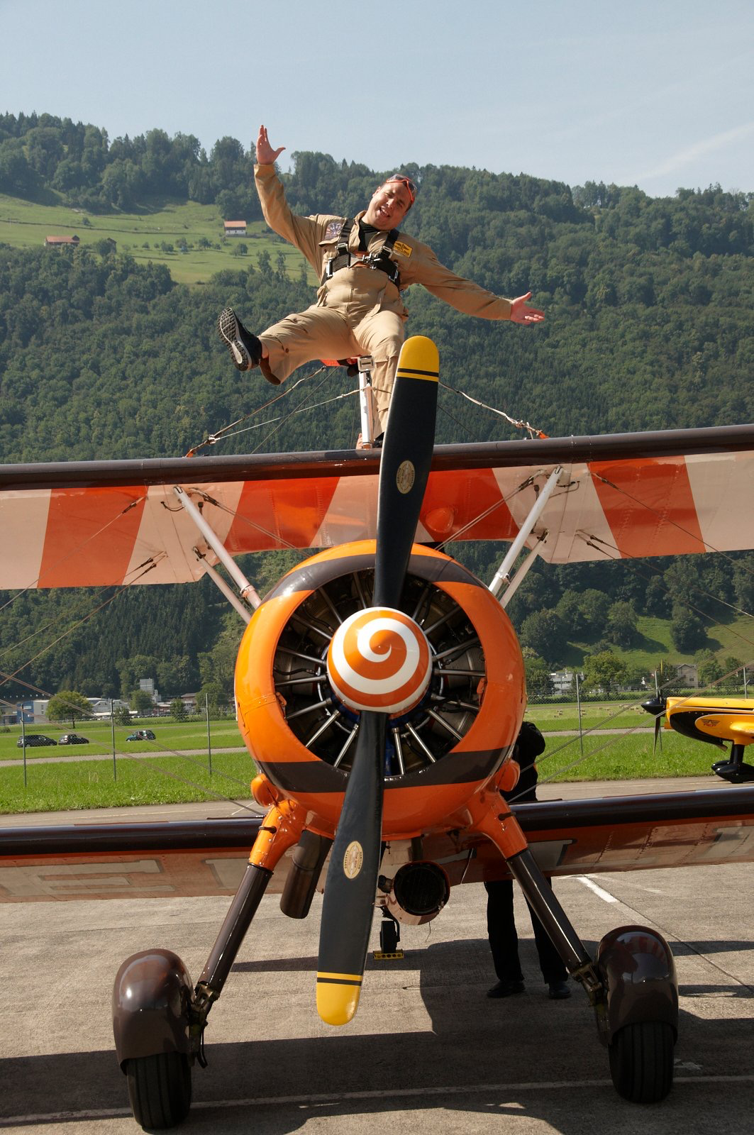 Christian Abrahamson on a Stearman biplane