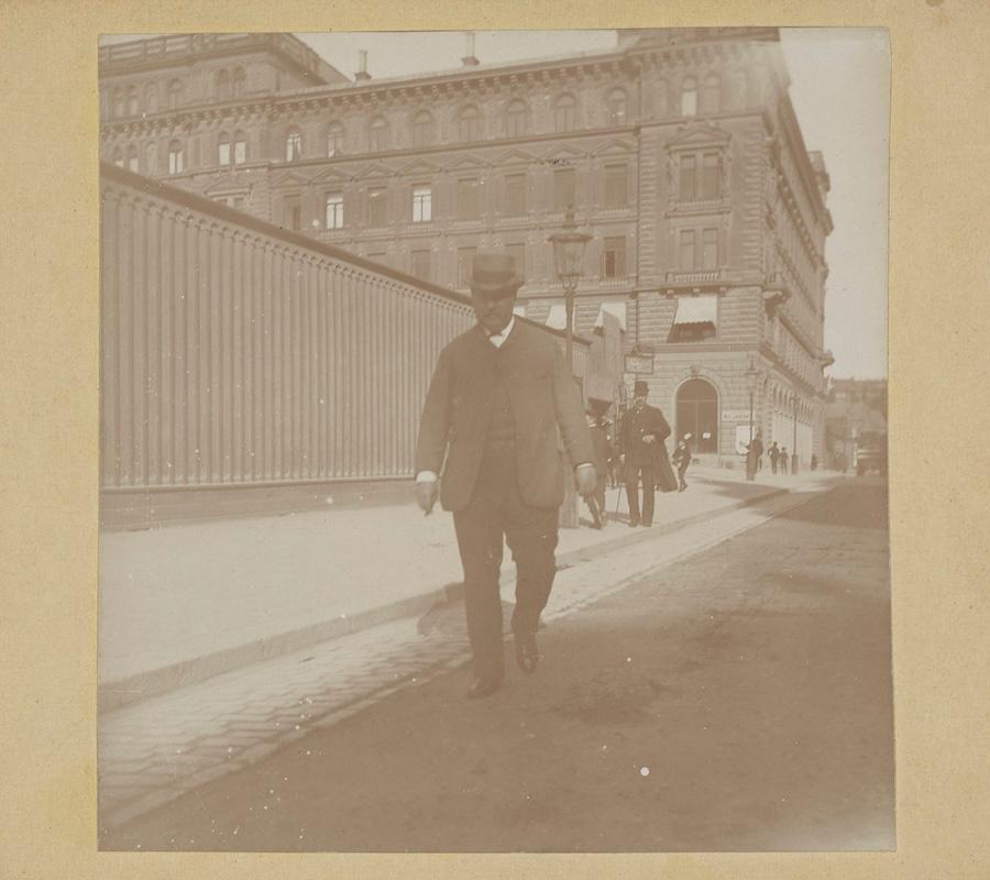 man walking down the street